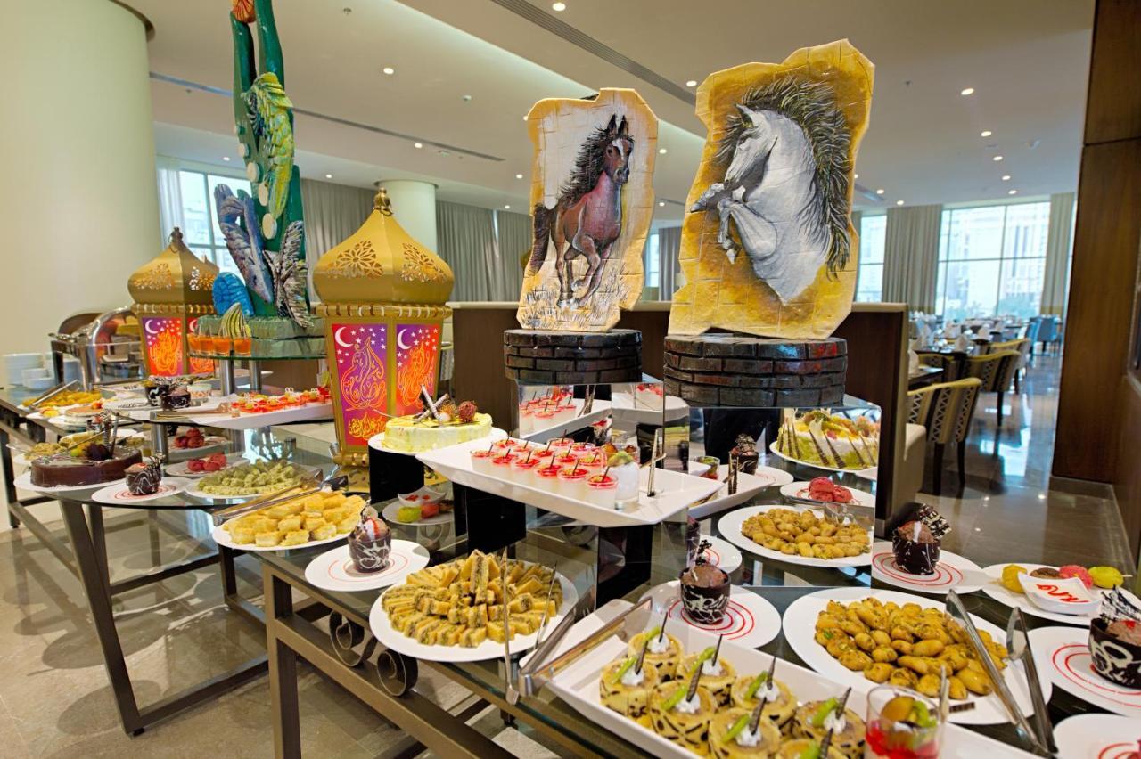 Holiday Suites Al Azizia Meca Exterior foto A buffet at the Jumeirah Jumeirah Hotel